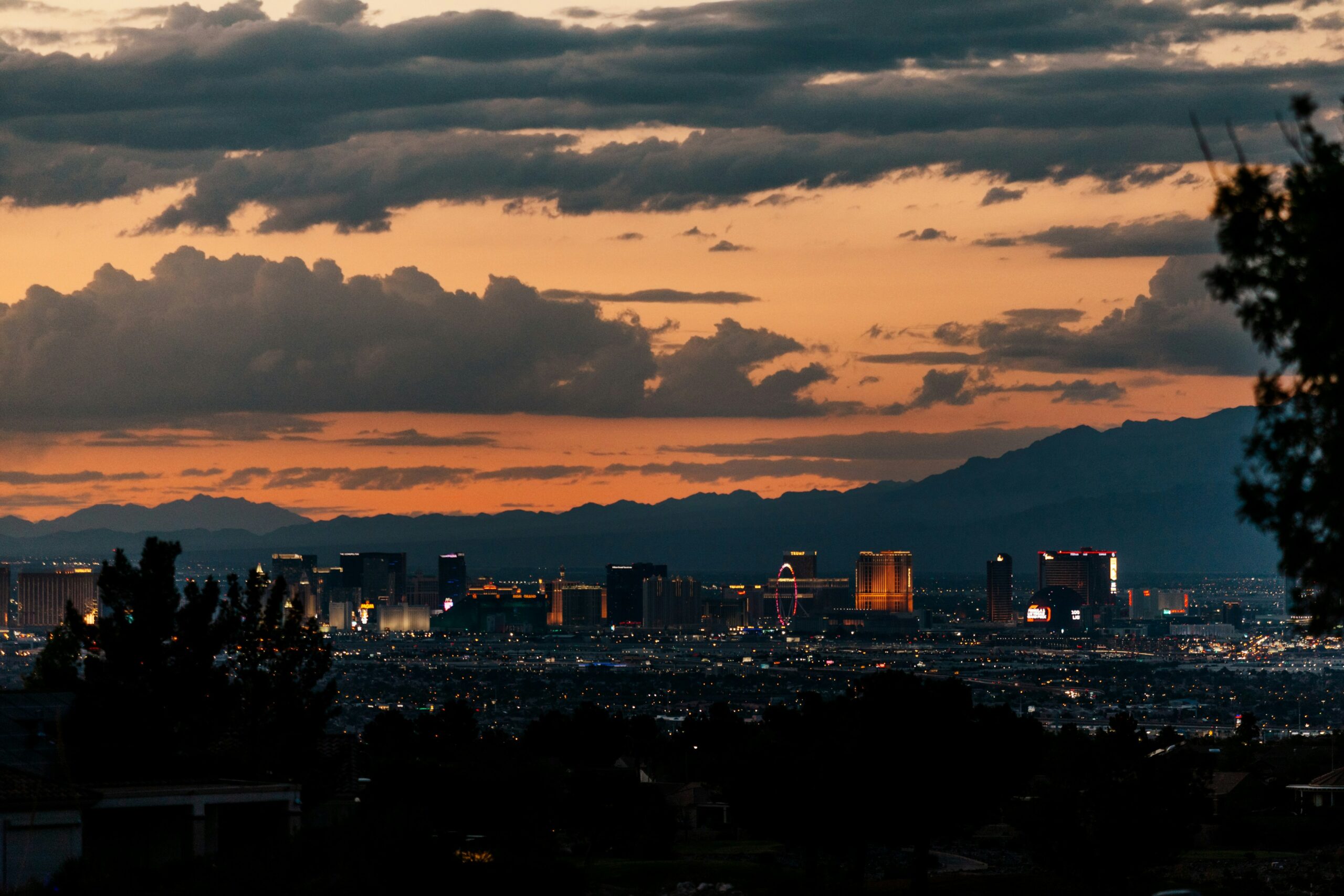 Las Vegas skyline at sunset with mountains in background